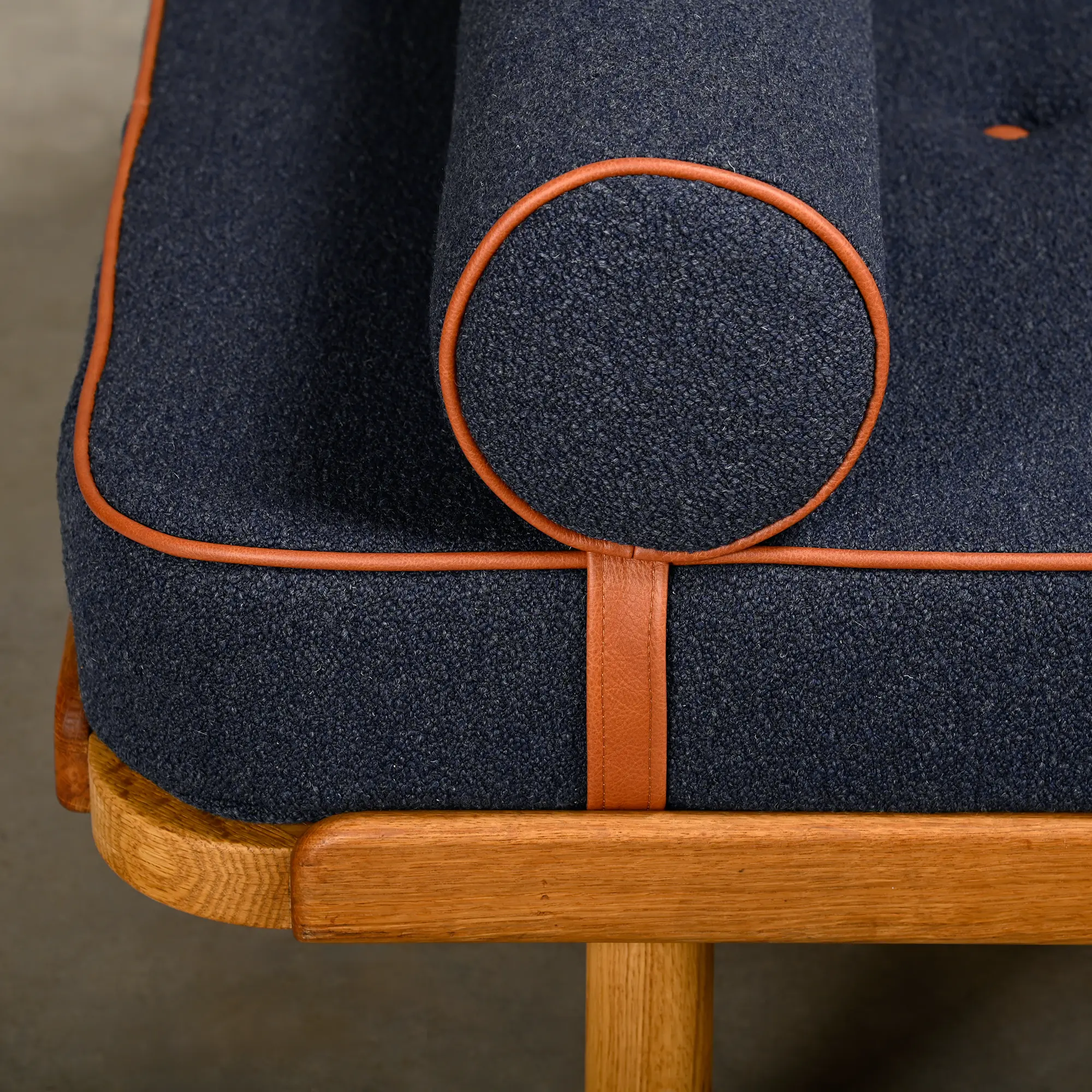 Scandinavian Daybed in Oak and dark Blue bouclé fabric with Leather accents